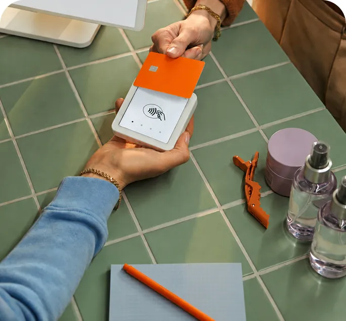 Tapping a Cashi card on a contactless payment terminal